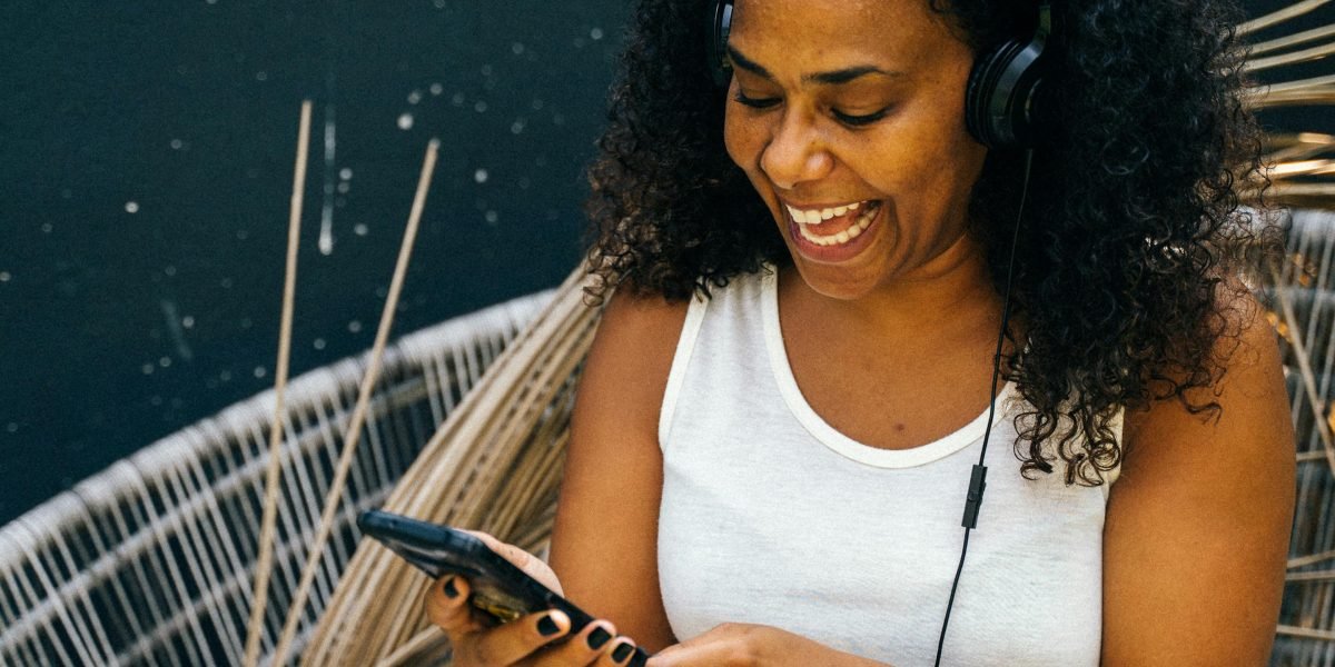 A person comfortably watching content on a tablet or TV, representing the ease of access to streaming movies.